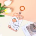 Bonito tarjetero deslizante con diseño de perrito y naranja para tarjetas de estudiantes. - Perro Naranja Pastel + Llavero de Tira de Cuero Naranja 3.3