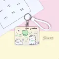 Cute cartoon cat sliding card holder with white braided wrist strap and metal keychain. - Beige Snack Frog Pattern / White Edged Wrist Strap