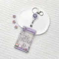Transparent purple claw machine ID badge holder with retractable reel and cute cartoon bear keychain. - Purple Claw Machine Pajama Bear Shaking / Transparent Sliding Cover + White Retractable Buckle (Purple Bear Head)