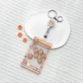 Transparent cute claw machine bear card holder with retractable reel and keychain for students. - Orange Claw Machine Milk Tea Bear Shaking / Transparent Sliding Cover + White Retractable Buckle (Beige Bear Head)