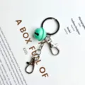 Cute candy color bell keychain with double lobster clasps mint green metal keyring accessory - Sea Green