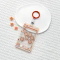 Cute claw machine style shaking card sleeve with transparent design and orange clasp for daily use. - Orange Claw Machine Milk Tea Bear Shaking / Sliding Transparent + 3.3 Orange Leather Strap Keychain