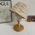 Detailed view of Japanese pleated bucket hat, breathable lightweight summer sun cap. - M (56-58cm) / Khaki
