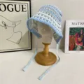 Handmade crochet hollow strap bucket hat detail view, breathable sun protection sun hat for women. - M (56-58cm) / Blue