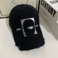 Detail shot of black distressed baseball cap with unique ninja embroidery and irregular curved brim. - M (56-58cm) / Black