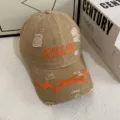 Gorra de béisbol vintage desgastada con bordado naranja y diseño streetwear moderno. - M (56-58cm) / Caqui