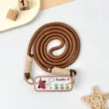 Cute puppy phone lanyard with acrylic charm, durable brown braided crossbody strap for daily use. - Flower Scarf Dog Head / Coffee/Milk Tea