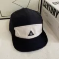 Schwarz-weiße 5-Panel-Camp-Cap mit Farbblock-Design und Detailansicht für Streetwear. - M (56-58cm) / Schwarz