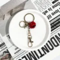 Red Bell Keychain Metal Key Ring DIY Bag Pendant Accessory - Stylish Red Charm Gift - Gold Clasp Four-Section Chain (Red Bell)