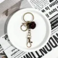 Porte-clés en métal avec cloche marron foncé et fermoirs dorés accessoire DIY pour sac - Fermoir Doré Chaîne à Quatre Sections (Cloche Brune)