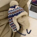 Detailed view of women winter knit thermal trapper hat with fluffy faux fur lining and pompom. - M (56-58cm) / Navy Blue