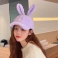 Cute plush rabbit ear baseball cap for women, autumn and winter warm lamb fleece duck tongue hat. - Purple