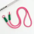 Pink woven mobile phone lanyard with green accents and metal rings, cross-body strap. - Peach Pink Crossbody Double Ring Braided Lanyard (Dark Green)