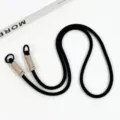 Black phone lanyard with beige woven accent and metal rings, versatile crossbody strap. - Black Crossbody Double-Loop Braided Cord (Milk Tea)