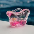 Porte-clés sac papillon transparent rempli de liquide avec lotus rose et paillettes fines - Forme de Sac Papillon