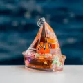 Porte-clés sable mouvant voilier avec poisson-clown, pendentif sac en acrylique. - Poisson-clown