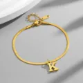 Gold-tone titanium steel snake chain anklet with letter K pendant for women fashion jewelry. - Letter K / Gold