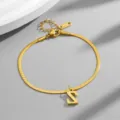 Gold tone titanium steel snake chain anklet featuring an elegant sleek letter S pendant design. - Letter Z / Gold