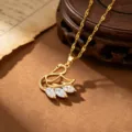 Gold titanium steel swan necklace detail, elegant diamond-accented pendant for women. - Swan Style (T0978) / Gold