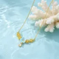 Gold-plated copper necklace featuring a blue flower and sparkling zircon crystal pendant for women. - Blue Flower Necklace