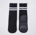 Black non-slip yoga socks with white stripes and silicone grip dots for fitness pilates. - One Size / Black