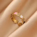 Detailed close-up of stainless steel star ring with colorful enamel and sparkling rhinestones. - Star Enamel Design (JZ9595G)