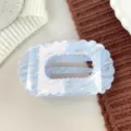 Blue iridescent flat shell hair claw clip, stylish resin wavy hair accessory for women variants. - Metallic Blue