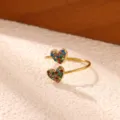 Chic gold-plated adjustable ring featuring dual colorful zirconia paved hearts for women. - Double Heart Rhinestone Style (JZ10401G) / Gold