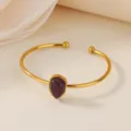 Close-up detail of the exquisite teardrop purple stone gold stainless steel open bangle. - Waterdrop Purple Faux Jade Style (B2040G-4)