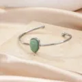 Minimalist open cuff bracelet featuring a teardrop green stone, chic stainless steel jewelry for women. - Steel Color Waterdrop Green Style (B2040P-1)