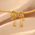 Gold stainless steel multi-loop drop earrings with delicate stars and dangling beads for women. - Three-Layer Star Fringe Style (E7336)