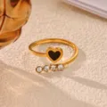 Close-up detail of 18k gold plated stainless steel open ring with black heart and sparkling crystals. - Black Heart Rhinestone Style (JZ9946G)