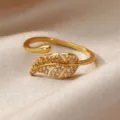 Minimalist gold open ring featuring a delicate leaf design encrusted with sparkling cubic zirconia. - Gold Pave Leaf Minimalist Style (JZ9335G)