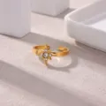 Gold plated stainless steel star ring open adjustable cubic zirconia jewelry for women beach. - Compass Star Rhinestone Style(JZ9575G)