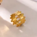 Close-up of gold plated stainless steel open ring with textured design and bead edges. - Parallel Texture (JZ9396G)