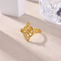 Detail shot of a minimalist 18k gold plated stainless steel Celtic knot open ring. - Celtic Knot Geometric Hollow Style (JZ9407G)