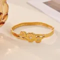 Gold plated stainless steel floral cuff bracelet with sparkling rhinestones for women fashion jewelry - Three Delicate Flowers Style (B2488G)