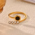 Stainless steel 18k gold plated geometric open ring with black circle and four crystals. - Black Disc Rhinestone Style (JZ9949G)