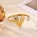 Gold-plated open cuff bracelet featuring a textured heart charm and sparkling rhinestone detail. - Hammered Heart Charm Style (B2279G)