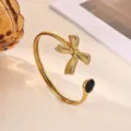 Golden stainless steel open cuff bracelet with ribbon bow and black stone variant fashion jewelry - Black Rhinestone Ribbed Bowknot Style (B2283G-2)