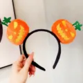 Serre-tête en peluche citrouille d'Halloween mignon accessoire de fête pour femmes et filles - Serre-tête en peluche jaune grimaçant