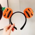 Serre-tête en peluche citrouille d'Halloween accessoire de costume de fête amusant femme - Serre-tête Citrouille Noire Grimaçante