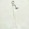 Porte-clés étoile argentée avec des lanières en cuir blanc, accessoire de sac élégant. - Blanc