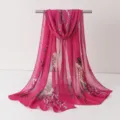 Close-up detail of Chinese style floral printed chiffon scarf, elegant shawl fabric texture. - Chiffon Gauze Scarf 1