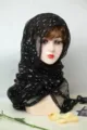 Black sequin chiffon headscarf detail showing shimmering glitter texture and draped style. - Black