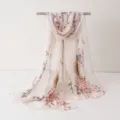 Chiffon floral print scarf detail, lightweight elegant shawl close-up view on display stand - Chiffon Scarf 4