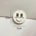 Round leather embroidered patch with smiley face design and size mark for clothing decoration. - Smiley Face Leather Patch / White