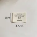 Etiquette tissee en coton faite main DIY couture vetements accessoires 3x4.5cm noeud - Lettre JOY avec Noeud