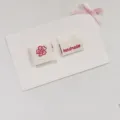 Handmade woven fabric labels with cute flower design, perfect for sewing bags, clothes and crafts. - Cherry Blossom