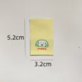 Joli badge d'étiquette tissée de chiot mignon pour vêtements de poupée DIY et décoration de vêtements. - Chien Jaune